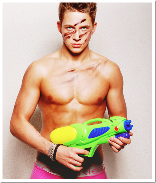 hot boy with super-soaker gun in ck underwear briefs