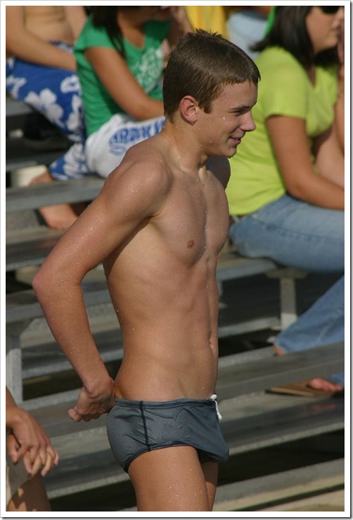 swimming boy in wet speedo with hardon