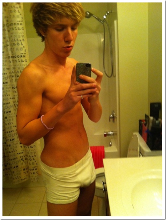 twink-in-bathroom-on-phone