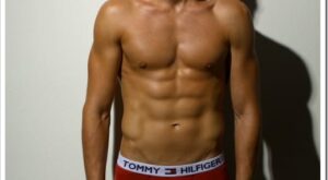 Tanned and Toned in Red Tommy Hilfiger Boxer Briefs