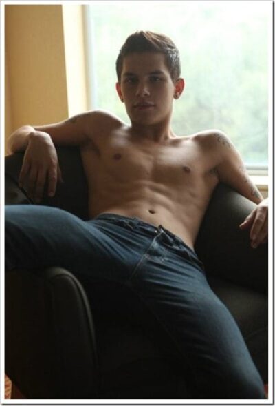 Sexy Boy Kicking Back In Jeans
