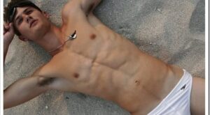 Speedo Saturday: Laying in the Sand