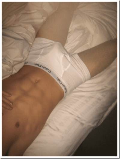 Sexy White Calvins on Satin White Sheets