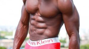 Big Black Muscle in Red Calvins