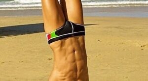 Beach Handstand with Sculpted Abs