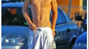 Blond Surfer Boy in Board Shorts