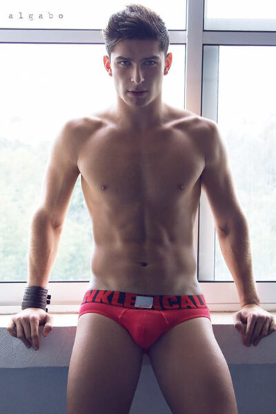 Muscle in Red Calvin Klein Briefs