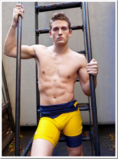 Blond Muscles in a Blue & Gold Singlet