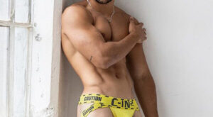 Caution, Hot Muscle in Yellow C-IN2 Jockstrap