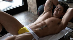 Flexing His Bulge in Yellow C-IN2 Jockstrap