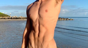 Muscle Boy in Very Skimpy Beach Bikini