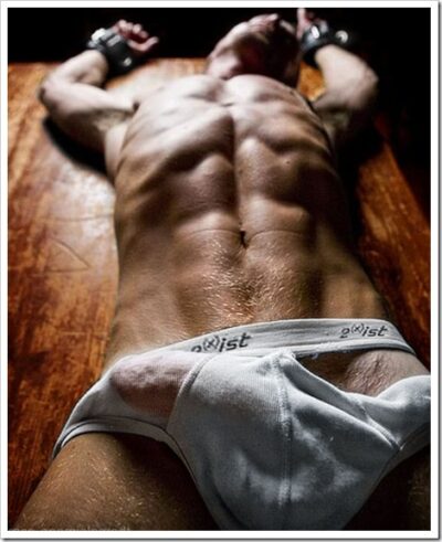 Handcuffed and hard in ripped briefs