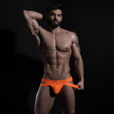 Hard Muscle in Neon Orange Jockstrap