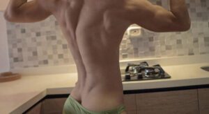 Flexing in Skimpy Bikini Briefs